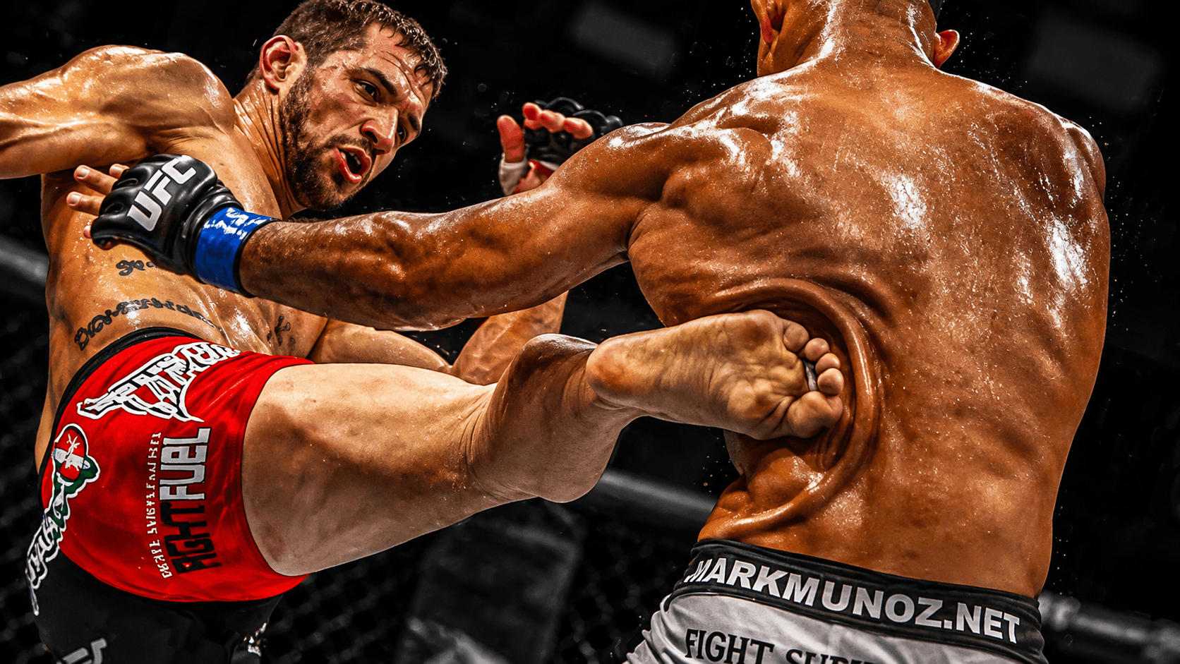 A round kick thudding into an opponent's ribs at close range.