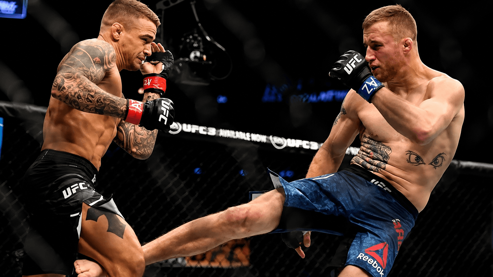 A fighter landing a kick to the lead leg.