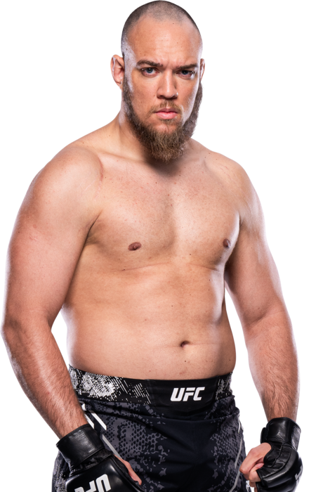 Valter Walker, UFC heavyweight, standing with gloves on.
